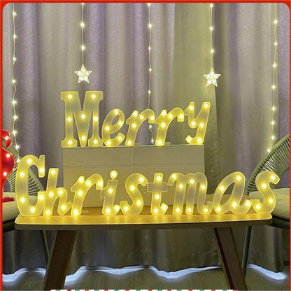 Luces navideñas con letras que dicen "Feliz Navidad"