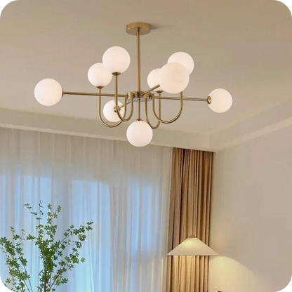 Glass Globe Brass Arm Chandelier