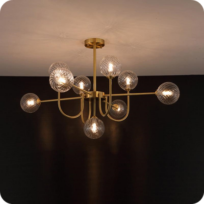 Glass Globe Brass Arm Chandelier