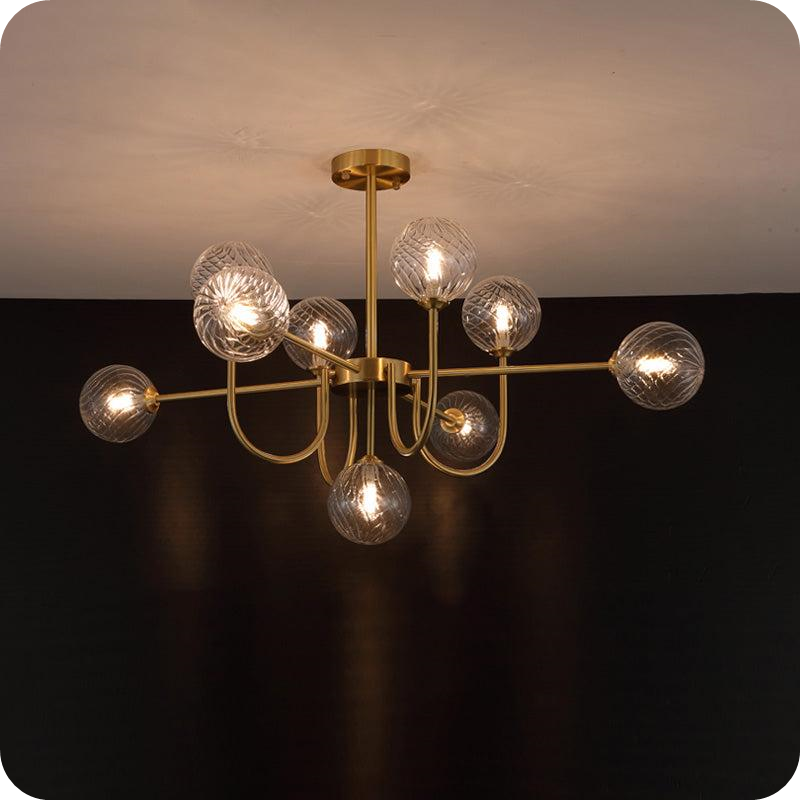 Glass Globe Brass Arm Chandelier