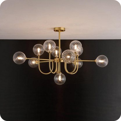 Glass Globe Brass Arm Chandelier